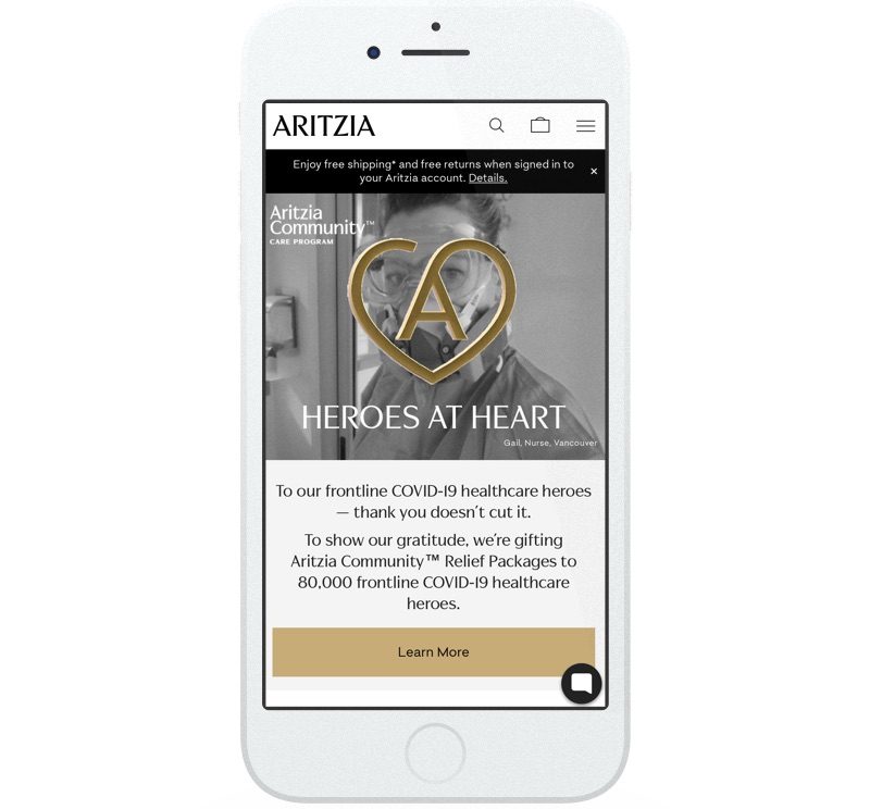 Aritzia’s website promotes free shipping and free returns. They also promote their community outreach initiative – the Aritzia Relief Packages program for frontline workers.